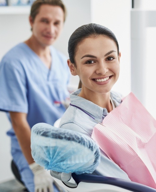 Woman smiling during appointment for dentistry in Belmar