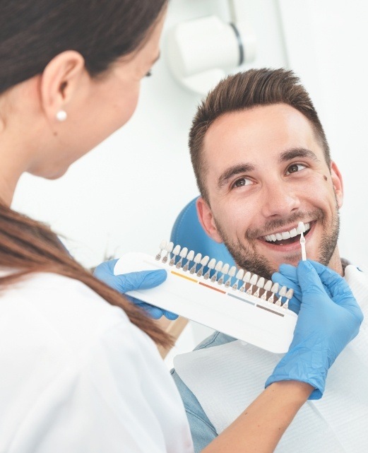 Man receiving dental services in Belmar