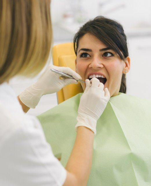 Patient receiving dental checkup