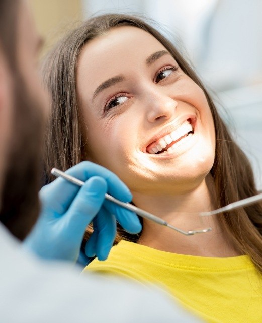 Woman smiling during dental visit