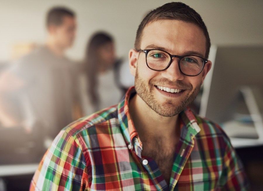 Man sharing healthy smile after oral cancer screening