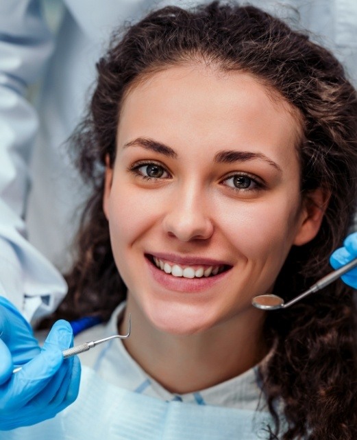 Woman receiving dental services in Wall Township