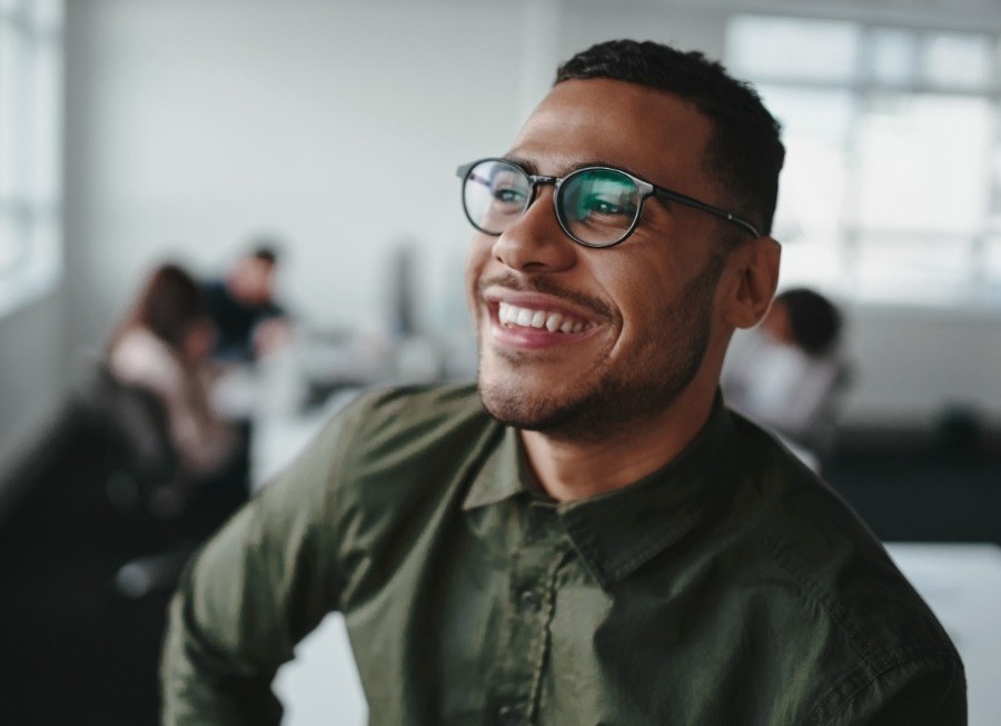 Man with bright smile after teeth whitening