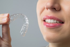 Address tooth alignment issues discreetly and comfortably with Invisalign clear aligners from Wall Township cosmetic dentist, Dr. Edward J. Dooley.  