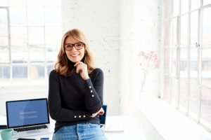 mature woman smiling at the camera 