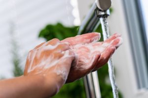 Spring Lake dentist washes their hands thoroughly in COVID-19