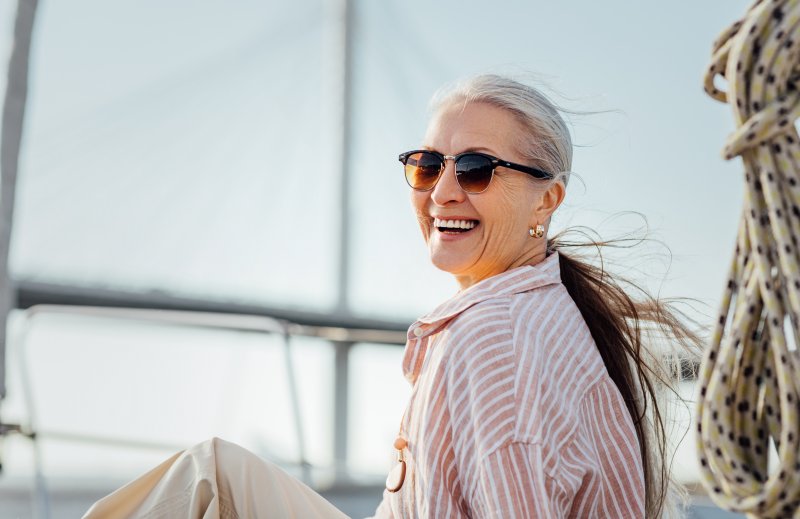Woman smiles on boat