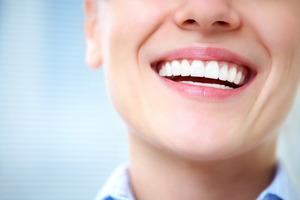 Close-up of a woman showing off her smile